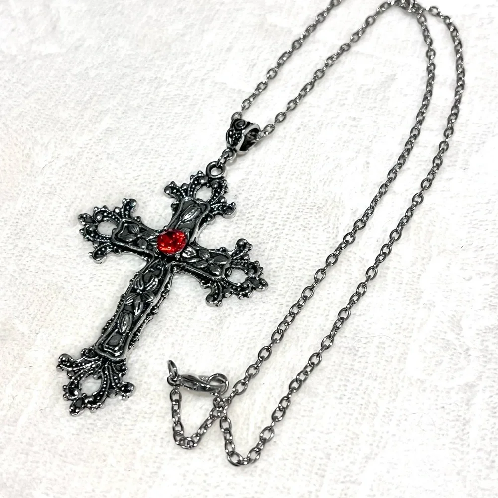 Silver Toned Cross Pendant with Red Gemstone